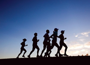 group of runners silhouette